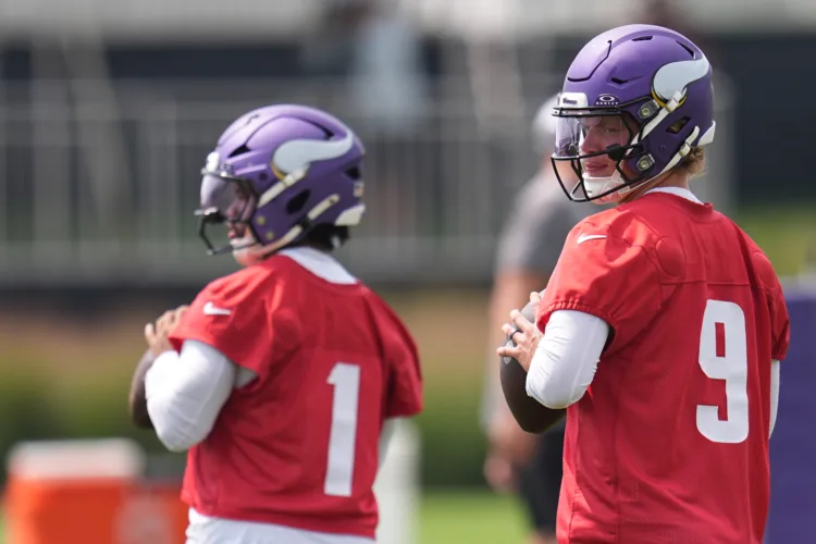 Vikings camp opens, QBs and teammates play it cool